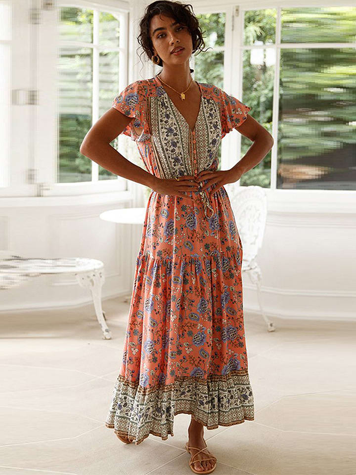 Sukienka w kolorze beżowo-pomarańczowym