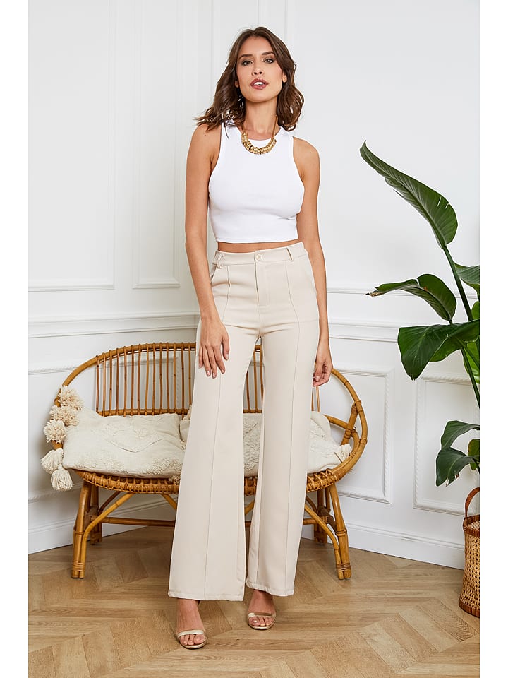 Spodnie "Fanol" w kolorze beżowym