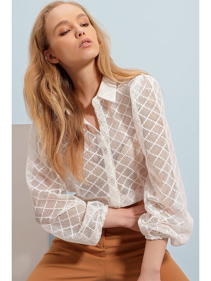 Bluzka w kolorze kremowym