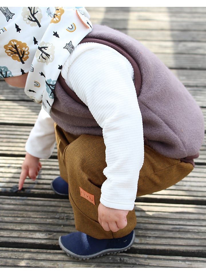 LiVi Softshellowe spodnie w kolorze musztardowym rozmiar: 104/110