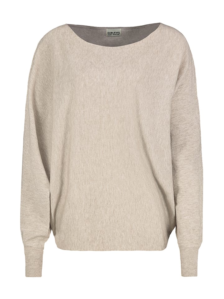 Sweter w kolorze beżowym