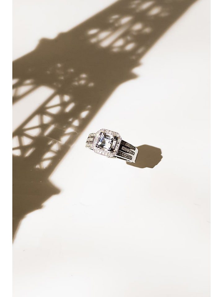 Złoty pierścionek "Remban" z diamentami i topazem