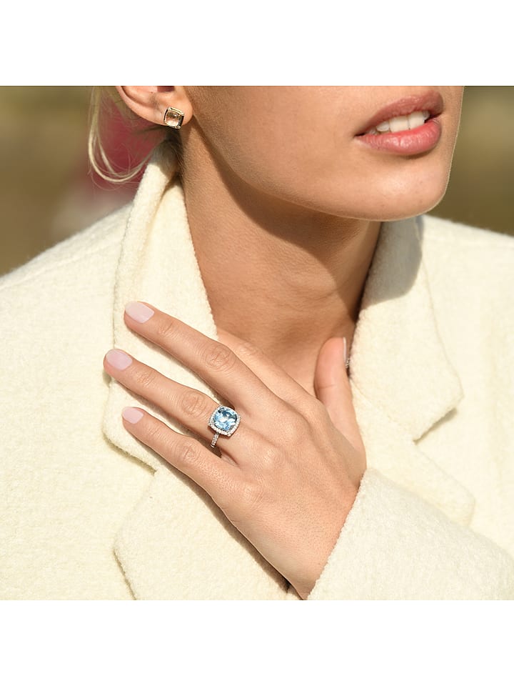 DIAMOND & CO Złoty pierścionek "Albury" z diamentami i topazem rozmiar: 52