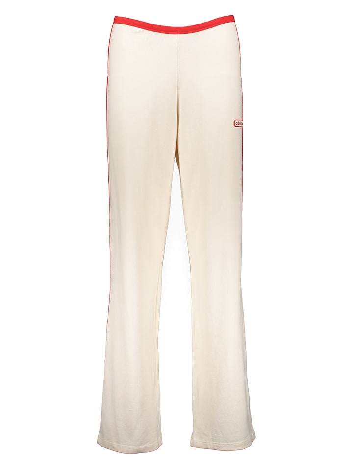 adidas Spodnie dresowe w kolorze kremowym rozmiar: 38