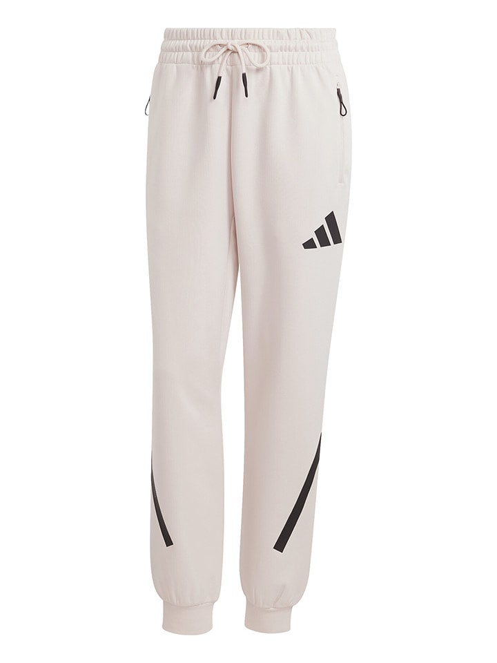 adidas Spodnie dresowe "Z.N.E." w kolorze kremowym rozmiar: XXS