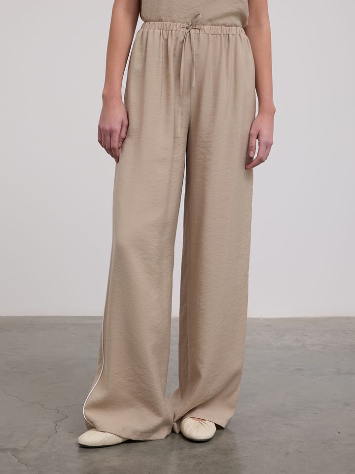 BGN Spodnie w kolorze beżowym rozmiar: 36