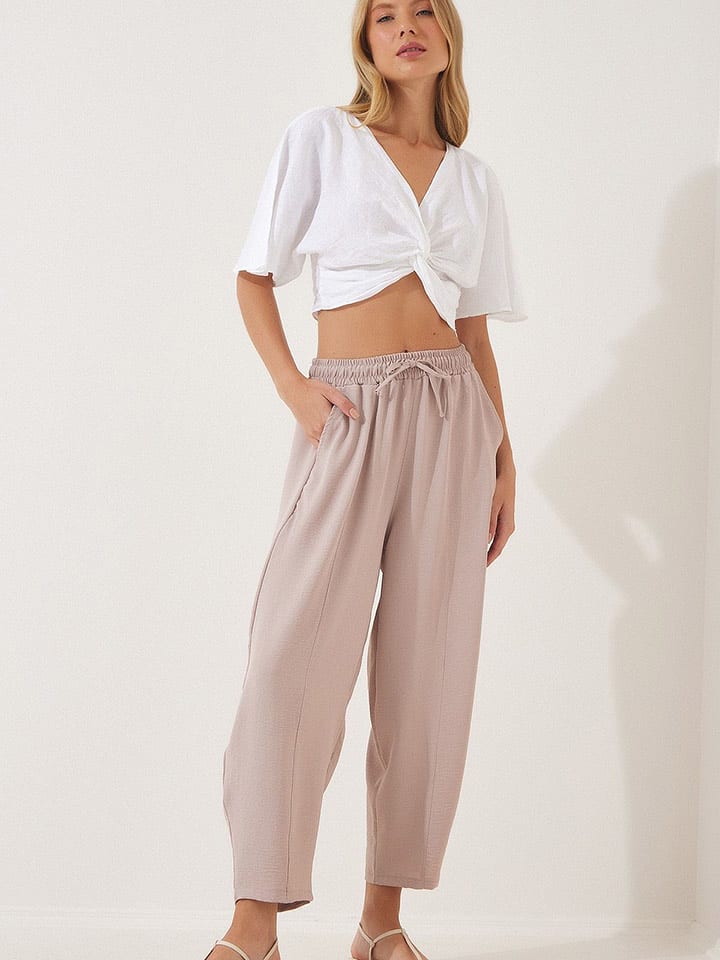 Happiness Istanbul Spodnie w kolorze beżowym rozmiar: 36