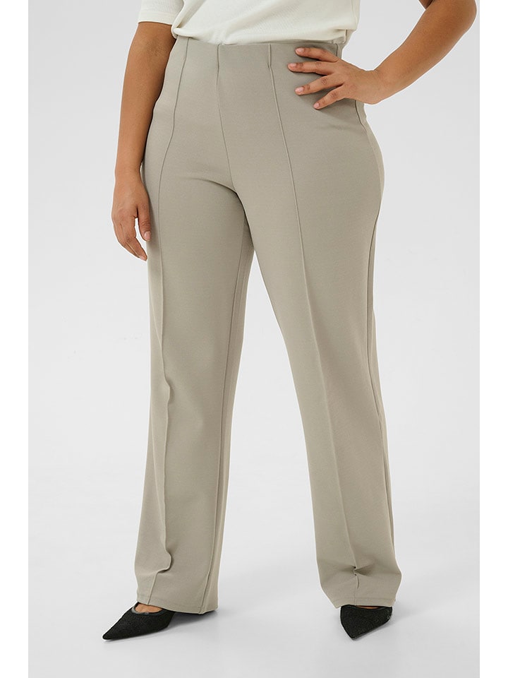 Kaffe Spodnie w kolorze kremowym rozmiar: M