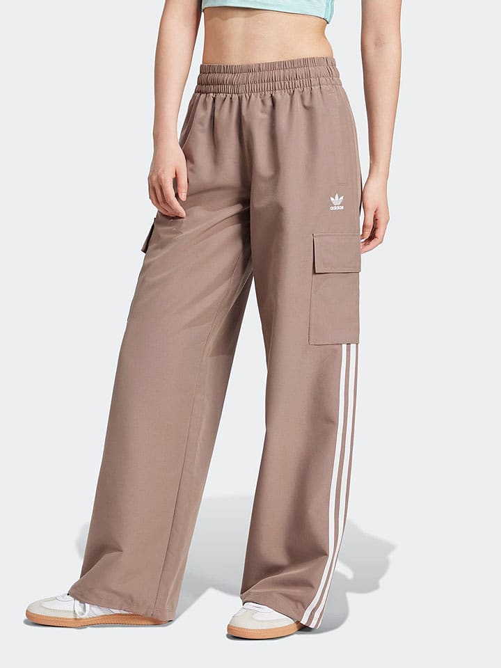 adidas Spodnie dresowe w kolorze jasnobrązowym rozmiar: S