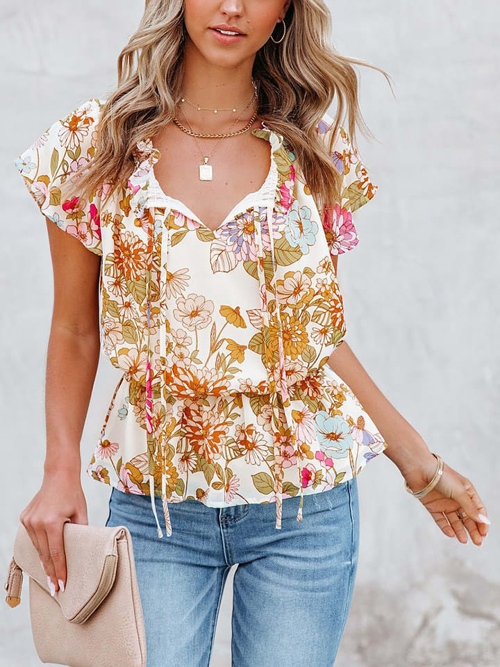 Milan Kiss Bluzka w kolorze kremowym ze wzorem rozmiar: M