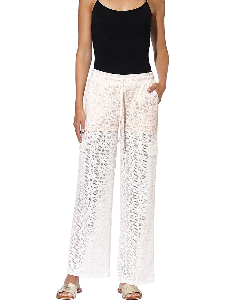 Heine Spodnie w kolorze kremowym rozmiar: 36