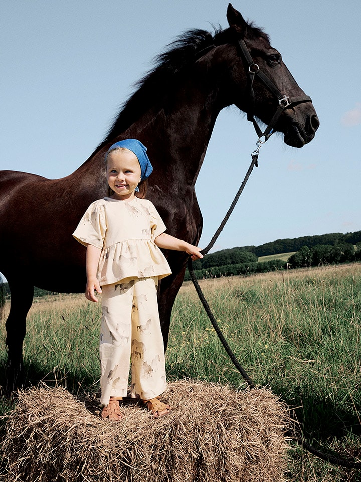 name it Spodnie "Helva" w kolorze żółtym rozmiar: 110