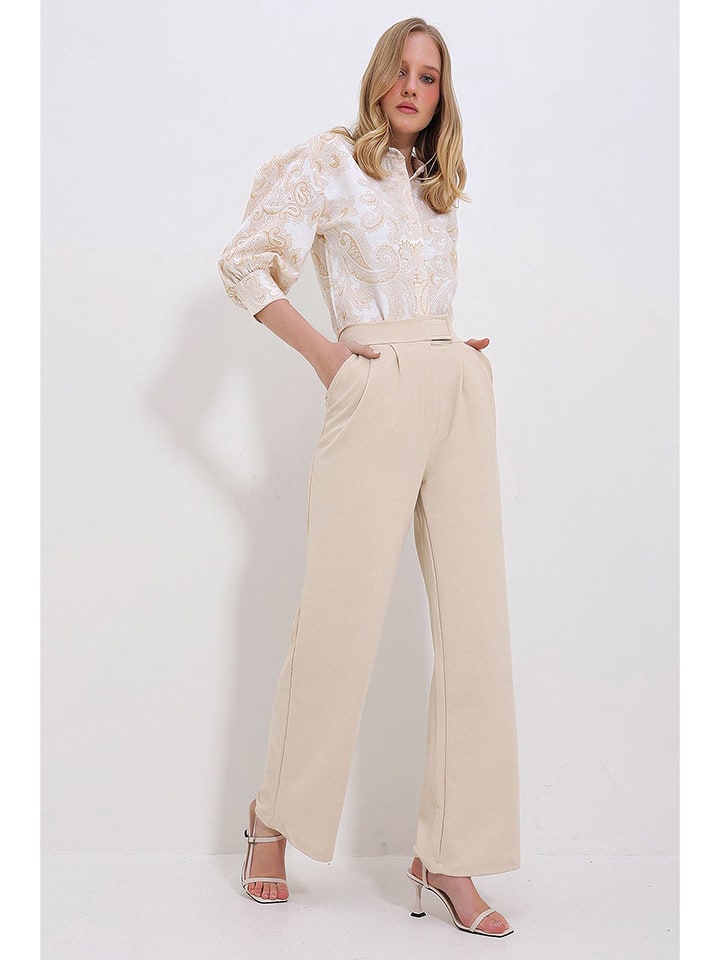 trendyol Spodnie w kolorze beżowym rozmiar: XL