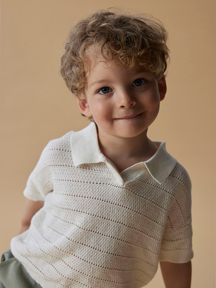 Lil Atelier Koszulka polo "Glivo" w kolorze kremowym rozmiar: 104