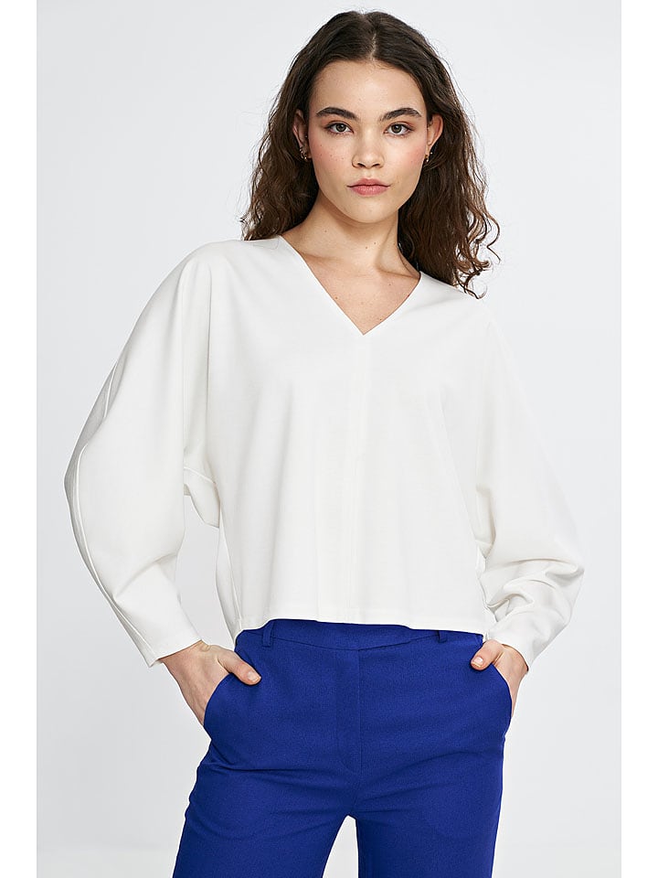 Nife Bluzka w kolorze kremowym rozmiar: 40/42