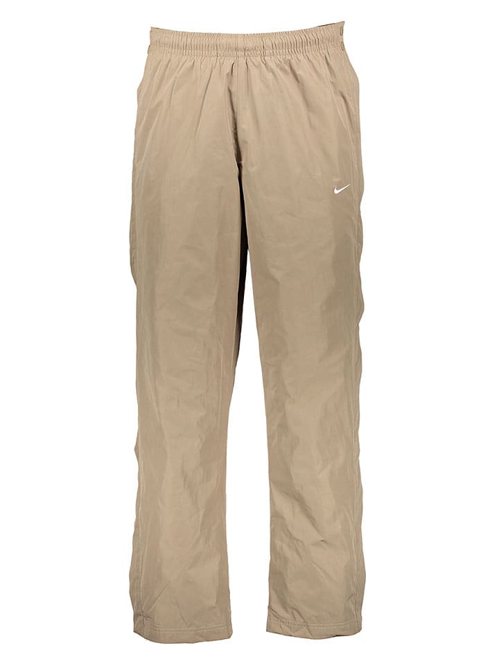 Nike Sportswear Spodnie sportowe "Authentics Tearaway" w kolorze beżowym rozmiar: S