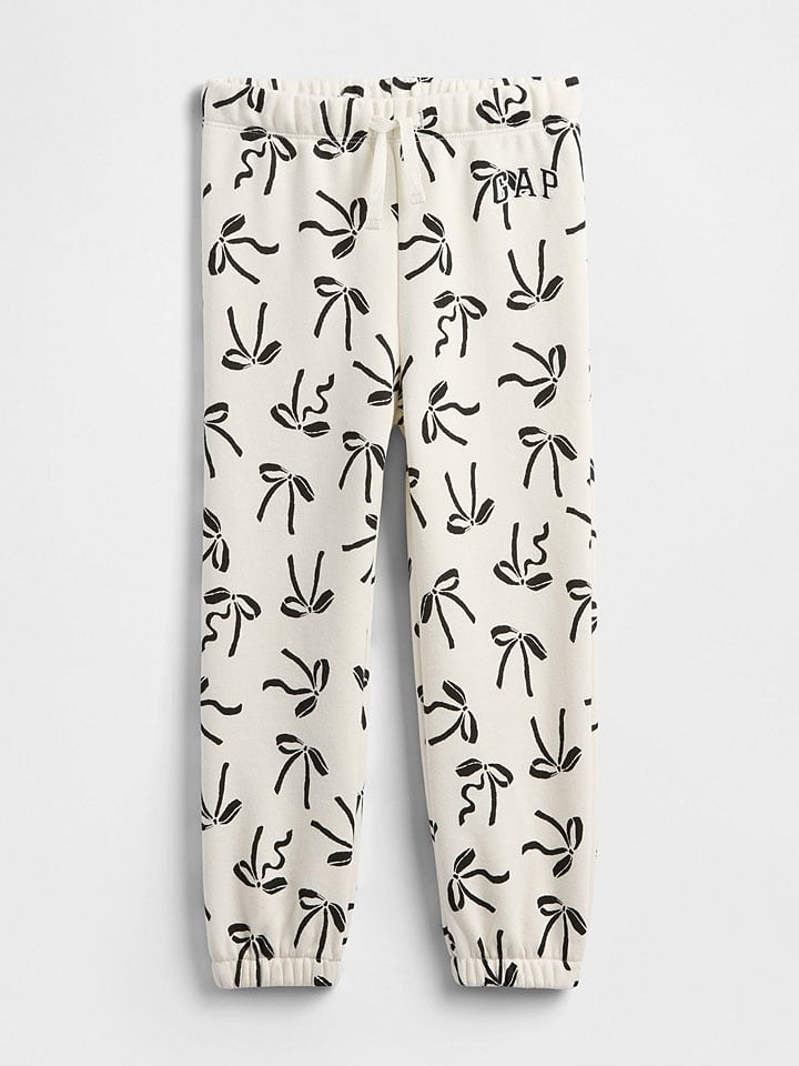 GAP Spodnie dresowe w kolorze kremowym rozmiar: 68/74