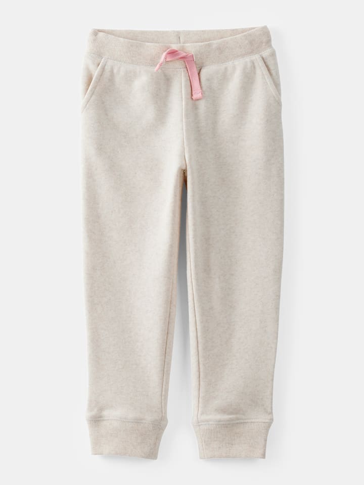 OshKosh Spodnie dresowe w kolorze kremowym rozmiar: 110