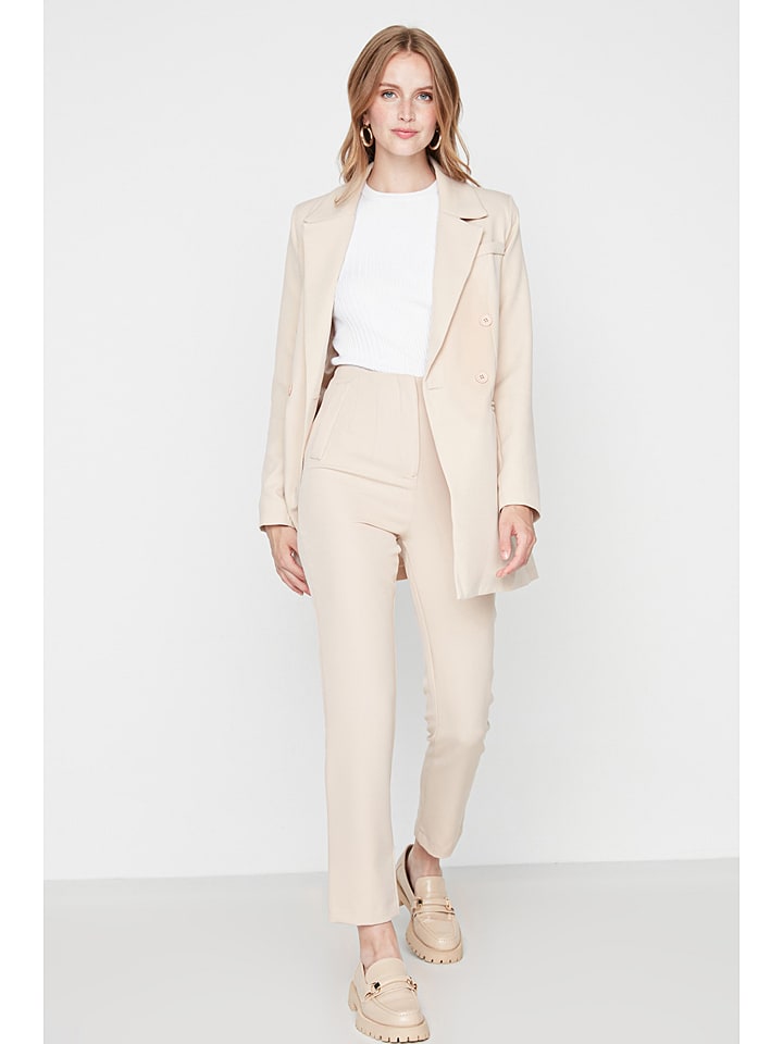 trendyol Spodnie w kolorze beżowym rozmiar: 32