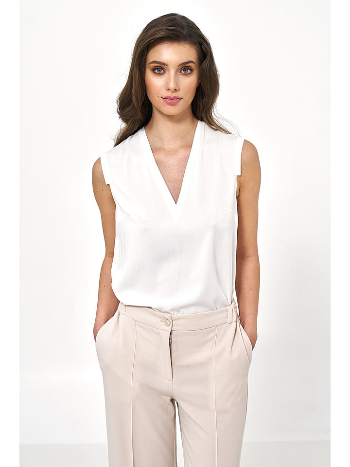 Nife Bluzka w kolorze kremowym rozmiar: 40