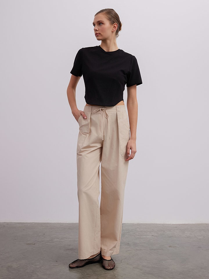 BGN Spodnie w kolorze beżowym rozmiar: 40