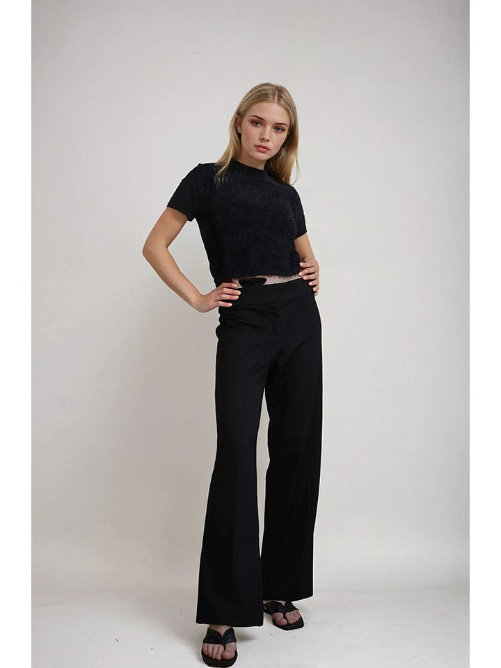 Monki Spodnie w kolorze czarnym rozmiar: 44