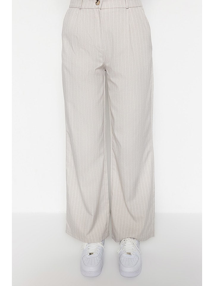 trendyol Spodnie w kolorze jasnoszarym rozmiar: 32