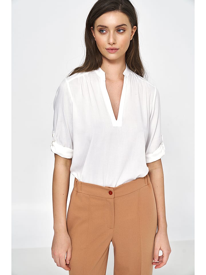 Nife Bluzka w kolorze kremowym rozmiar: 40