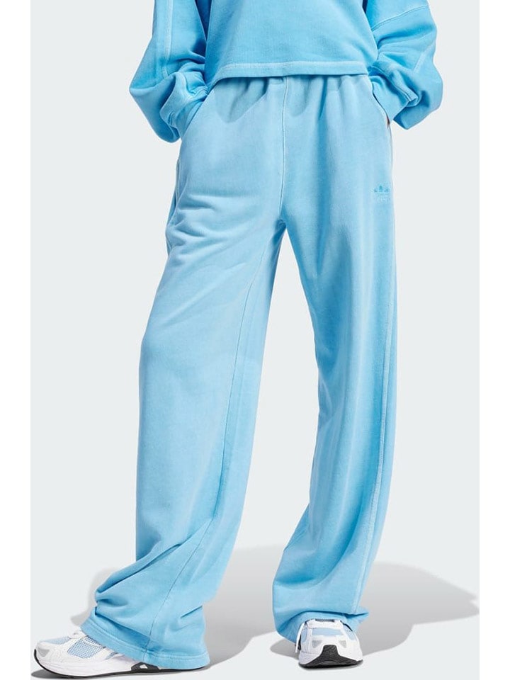 adidas Spodnie dresowe "ESS+" w kolorze niebieskim rozmiar: L
