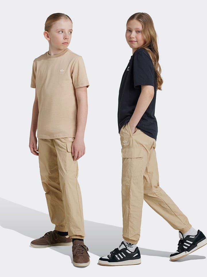 adidas Bojówki w kolorze beżowym rozmiar: 140