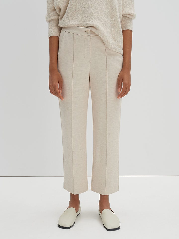 Someday Spodnie w kolorze kremowym rozmiar: 42