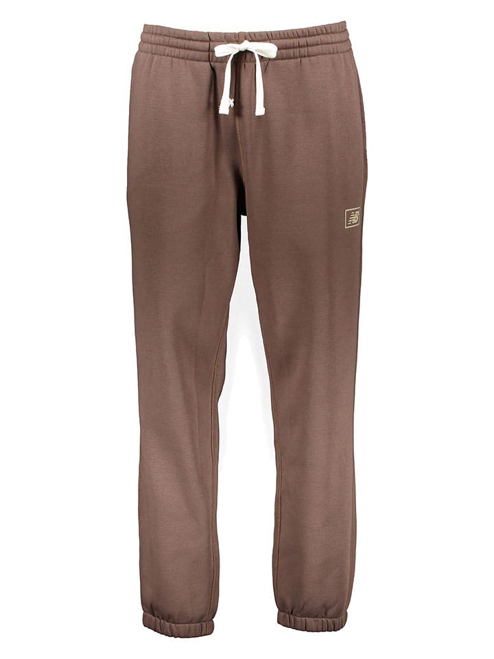 New Balance Spodnie dresowe "Essentials Brushed" w kolorze jasnobrązowym rozmiar: XL