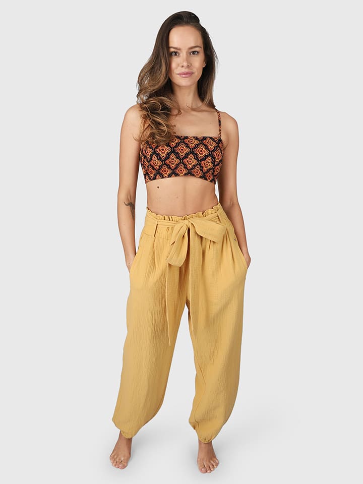 Brunotti Spodnie "Mabel" w kolorze żółtym rozmiar: L