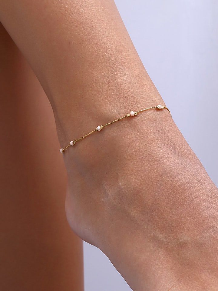 Nakkash Pozłacana bransoletka z kryształami na kostkę rozmiar: onesize