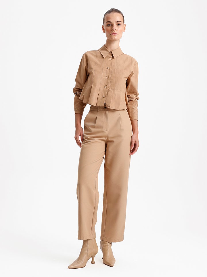 BGN Spodnie w kolorze beżowym rozmiar: 36