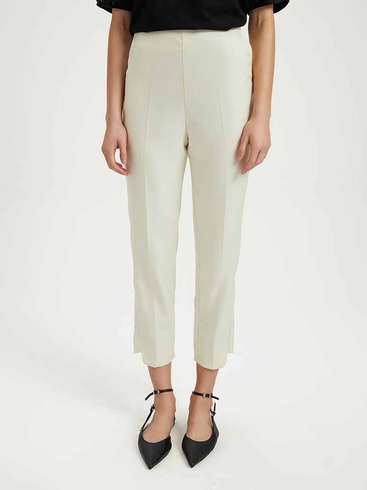 BGN Spodnie w kolorze kremowym rozmiar: 40