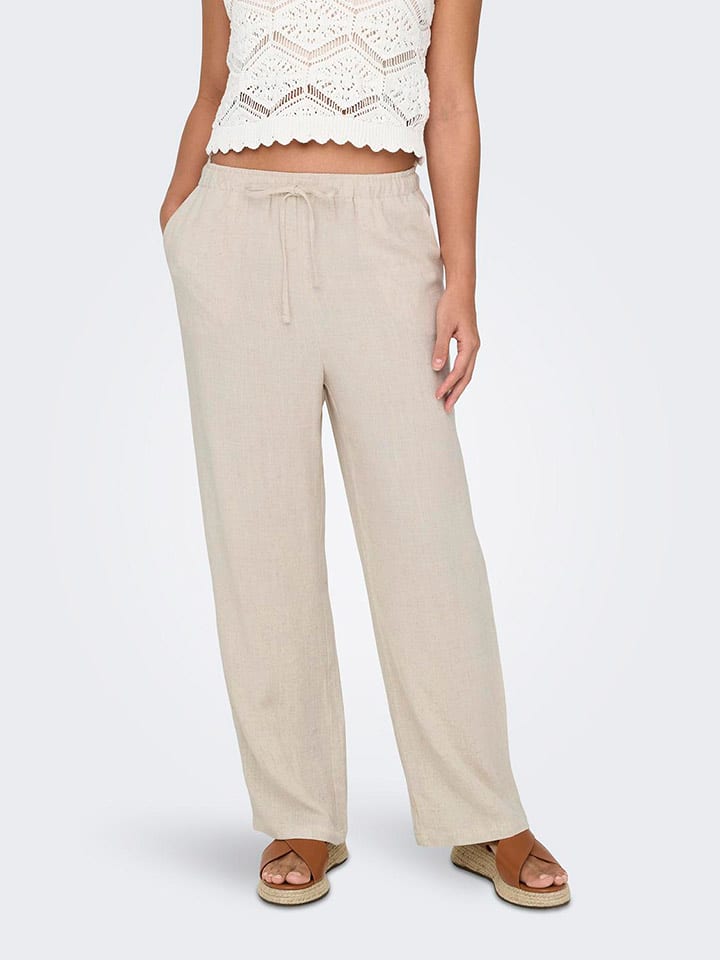 ONLY Spodnie w kolorze kremowym rozmiar: M/L32