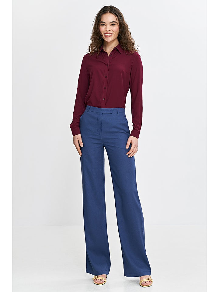 Nife Spodnie w kolorze niebieskim rozmiar: 40