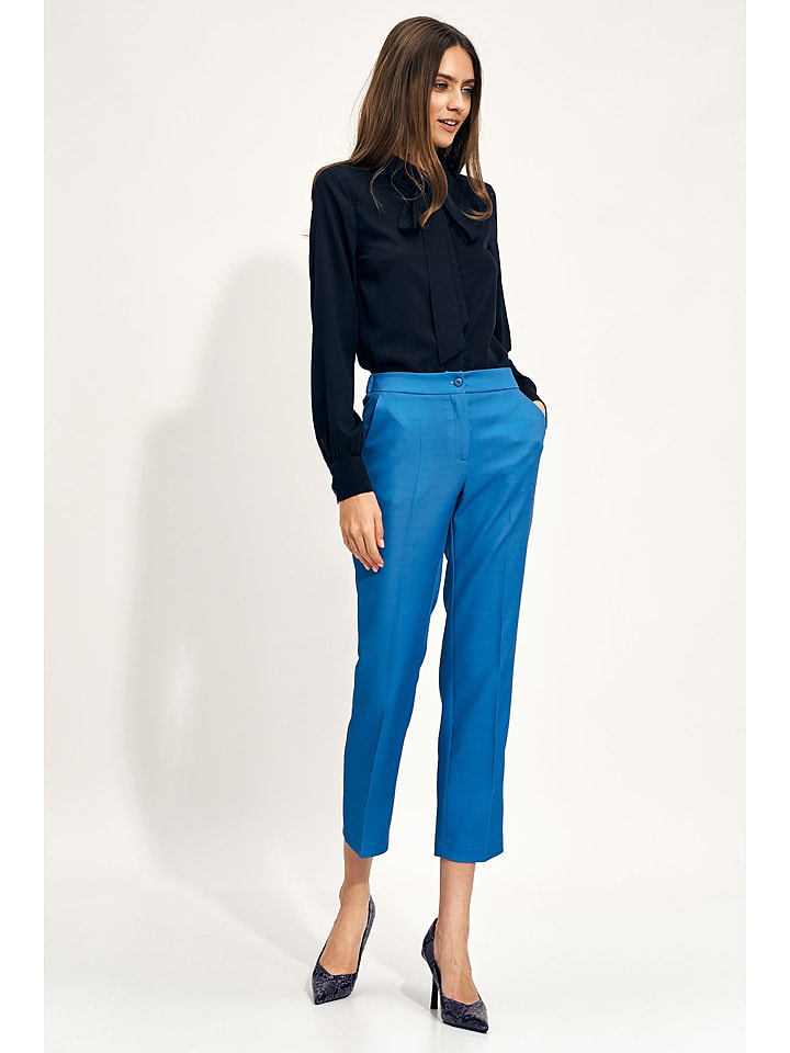 Nife Spodnie w kolorze niebieskim rozmiar: 40