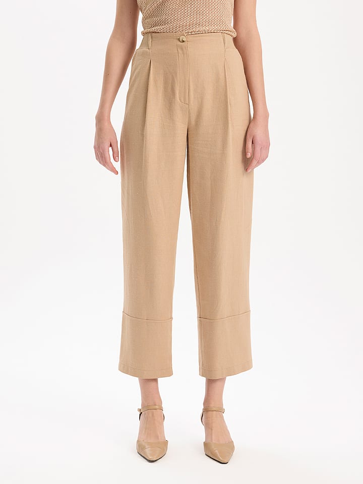 BGN Spodnie w kolorze beżowym rozmiar: 34