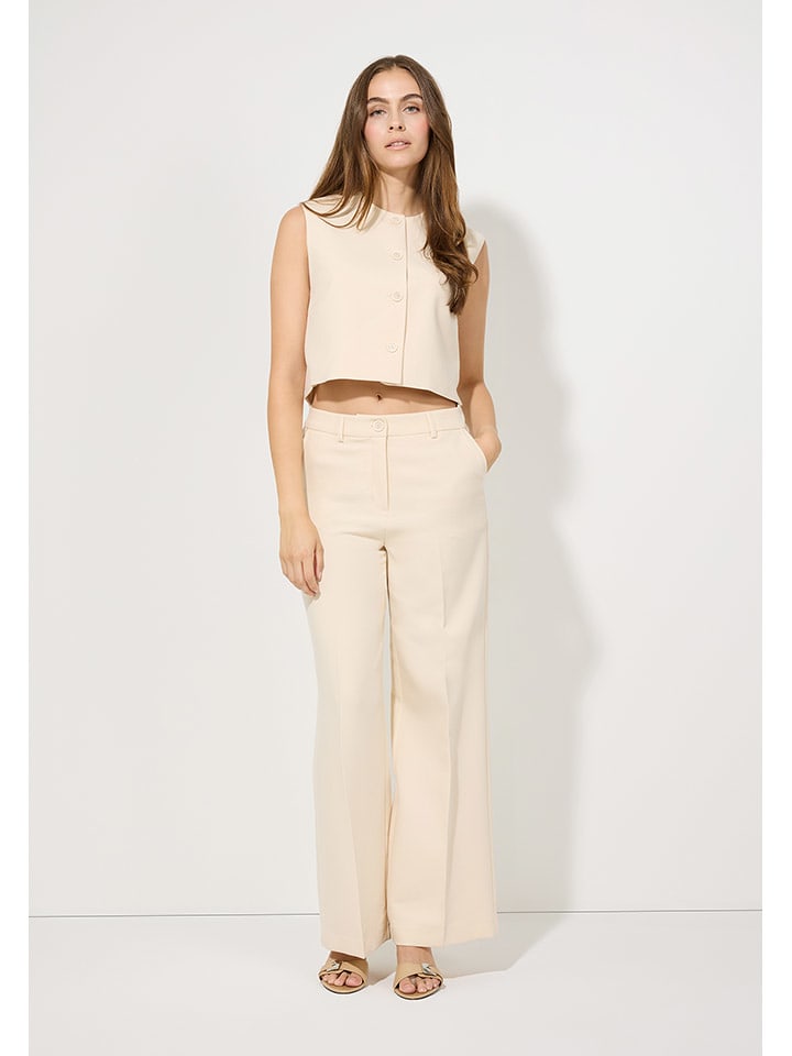 More & More Spodnie w kolorze kremowym rozmiar: 46