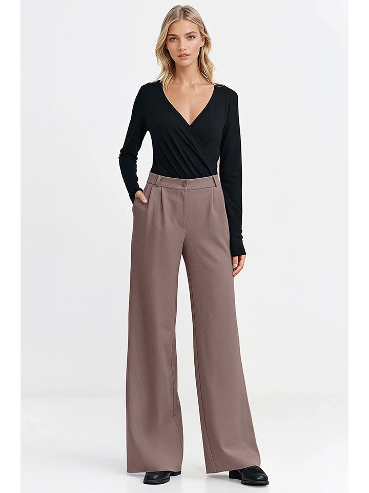 Nife Spodnie w kolorze jasnobrązowym rozmiar: 40