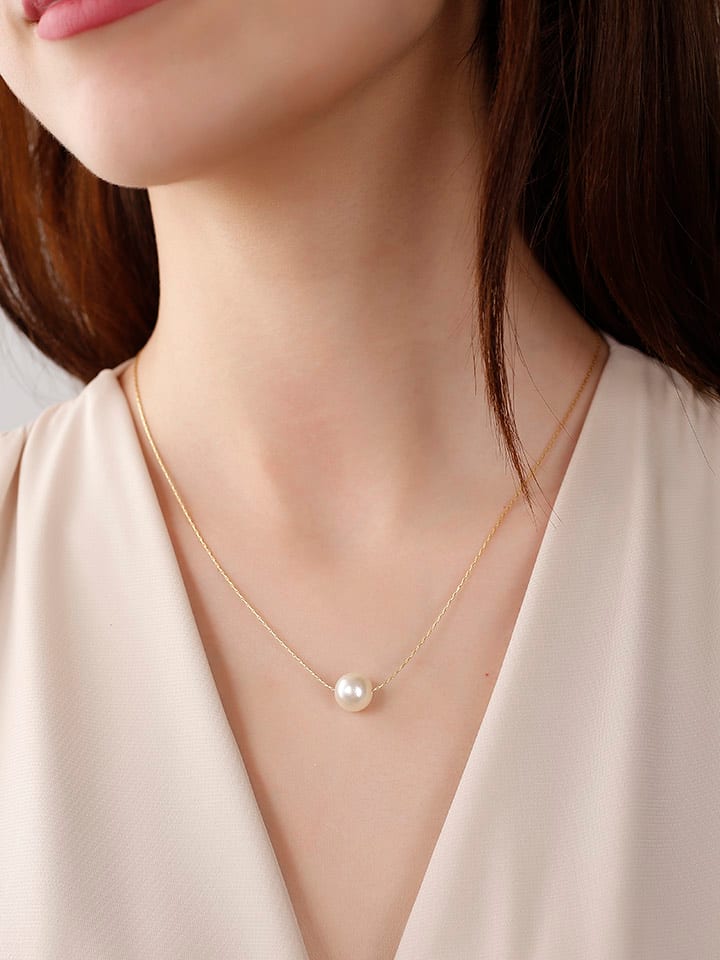 Nakkash Pozłacany naszyjnik z perłami syntetycznymi - dł. 42 cm rozmiar: onesize