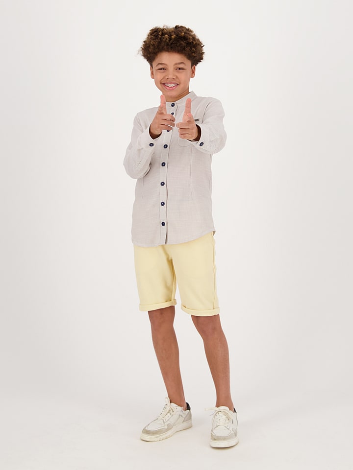 Vingino Bermudy "Rig" w kolorze kremowym rozmiar: 140