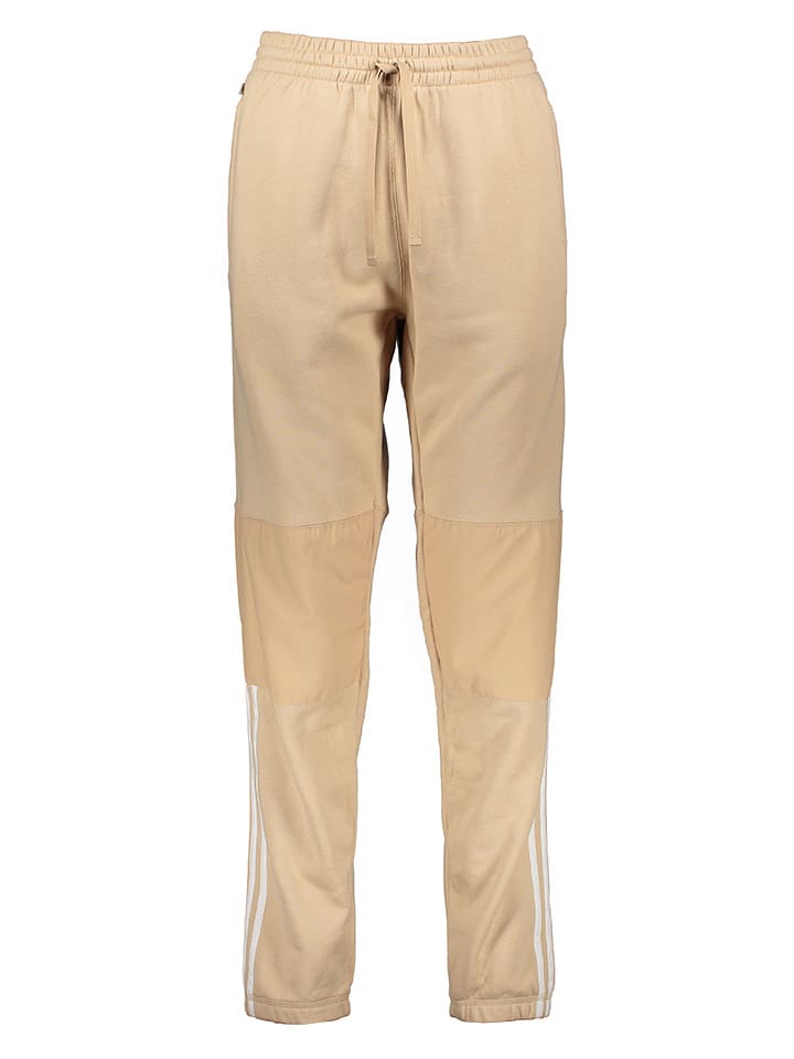 adidas Spodnie dresowe "Parley" w kolorze beżowym rozmiar: L
