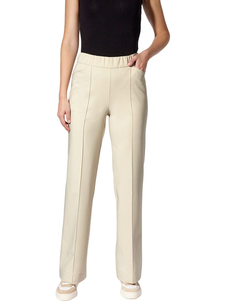 Heine Spodnie w kolorze kremowym rozmiar: 44