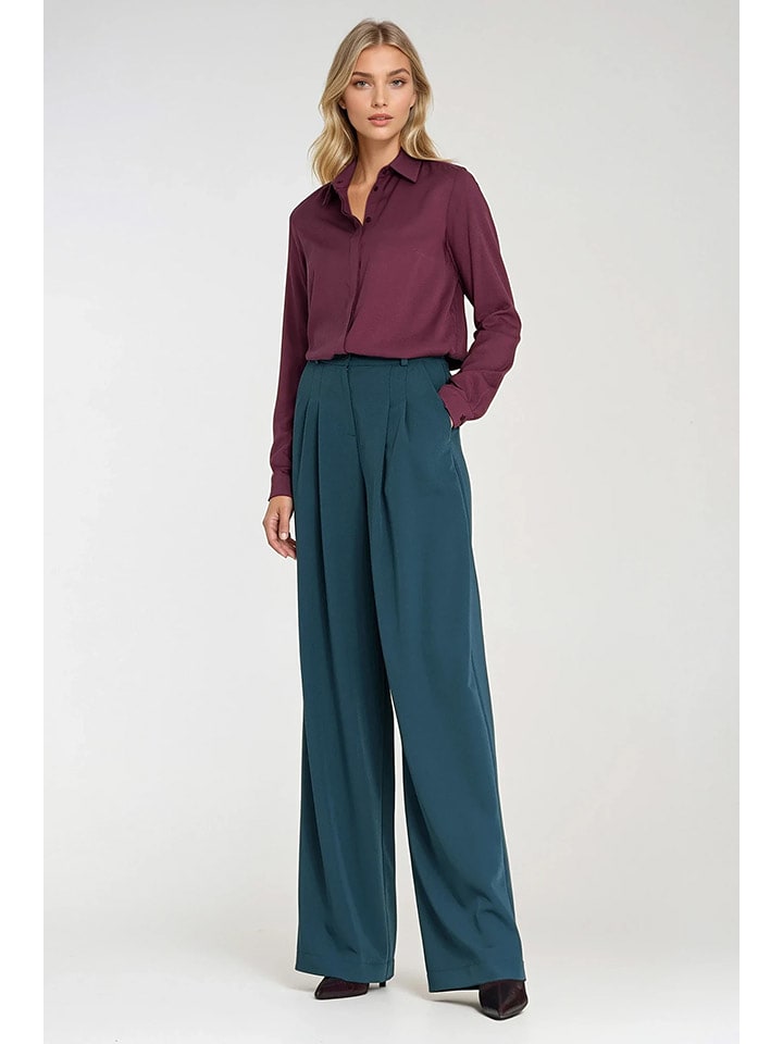 Nife Spodnie w kolorze niebieskim rozmiar: 42