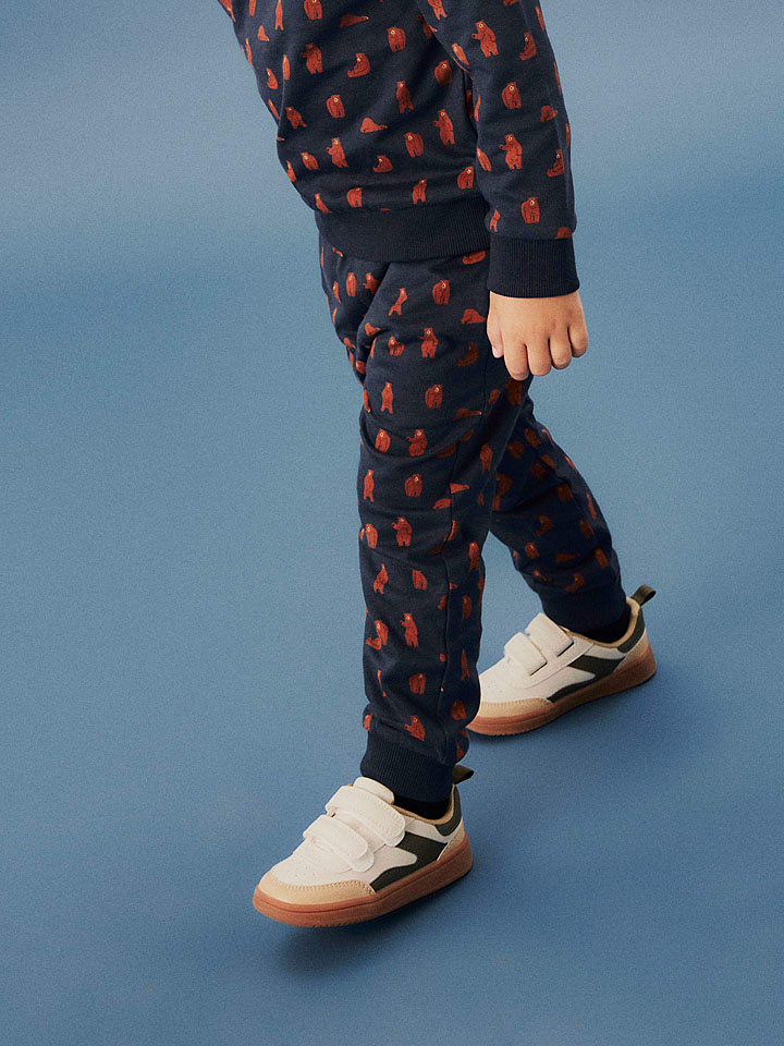 name it Spodnie dresowe "Nenean" w kolorze granatowym rozmiar: 92