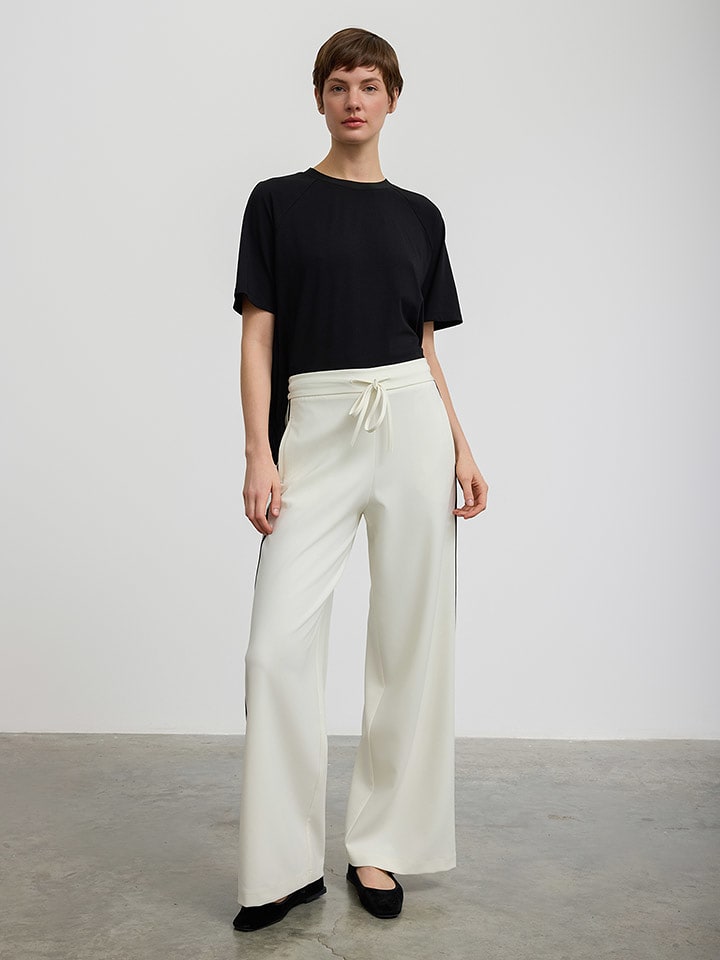 BGN Spodnie w kolorze kremowym rozmiar: 36