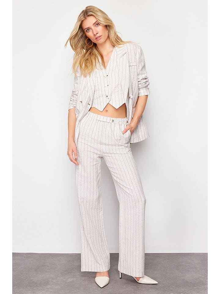 trendyol Spodnie w kolorze beżowym rozmiar: 36